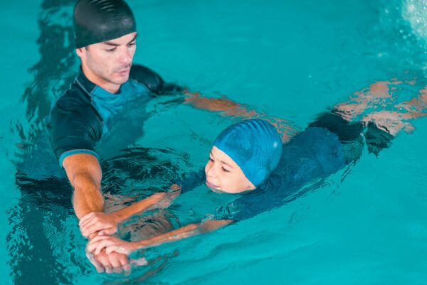 Boy on swimming class